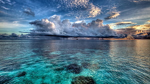 Tropical Ocean Horizon With Dramatic Storm Clouds And Turquoise Shallow Waters HD wallpaper
