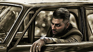 Karan Aujla Leaning Out of Vintage Car Window in Sepia Tone HD wallpaper