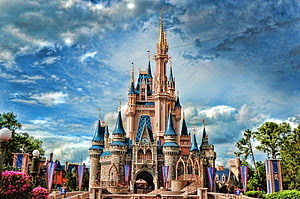 Cinderella Castle at Walt Disney World with Blue Spires and Dramatic Sky HD wallpaper