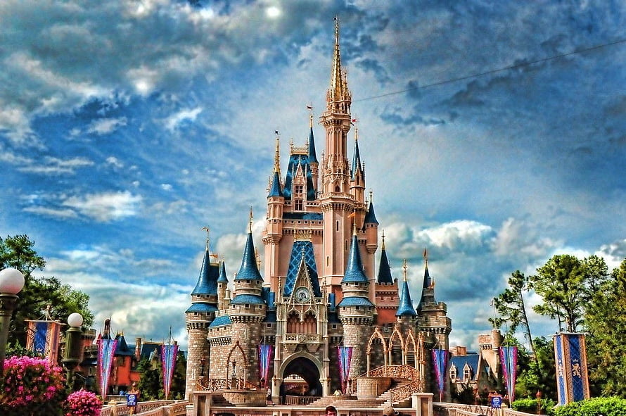 Cinderella Castle at Walt Disney World with Blue Spires and Dramatic Sky HD wallpaper