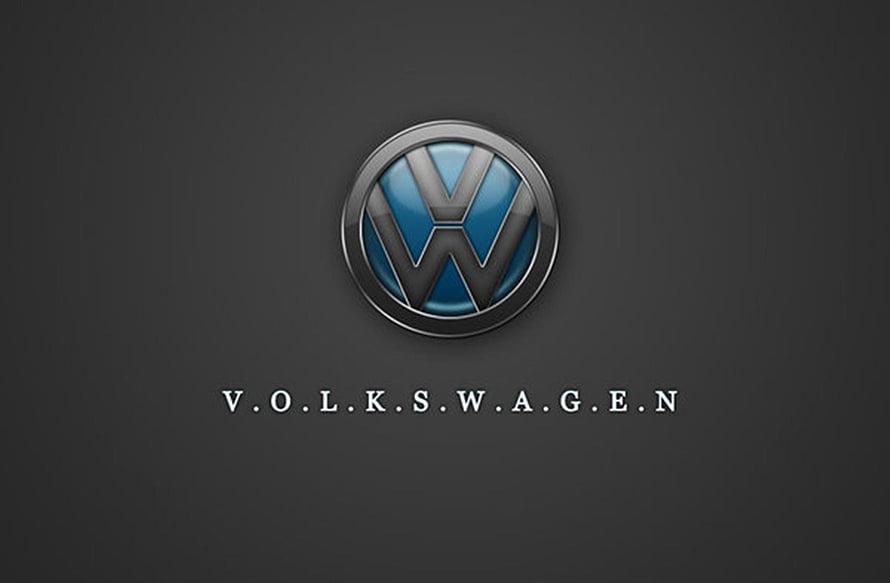 Volkswagen Emblem on Dark Background with Metallic Chrome and Blue Accents HD wallpaper