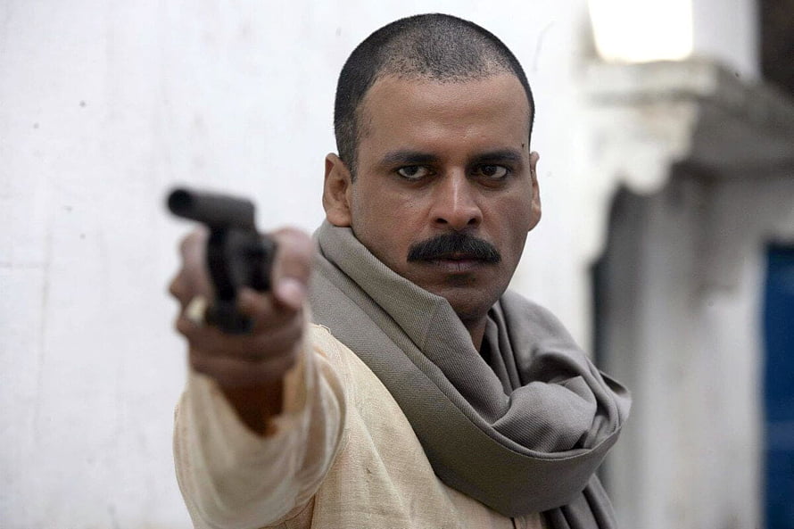 Manoj Bajpayee as Sardar Khan in Gangs of Wasseypur Holding a Pistol HD wallpaper