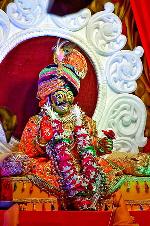 Mahakal Murti in Ornate Turban and Floral Garlands at Ujjain Temple HD phone wallpaper