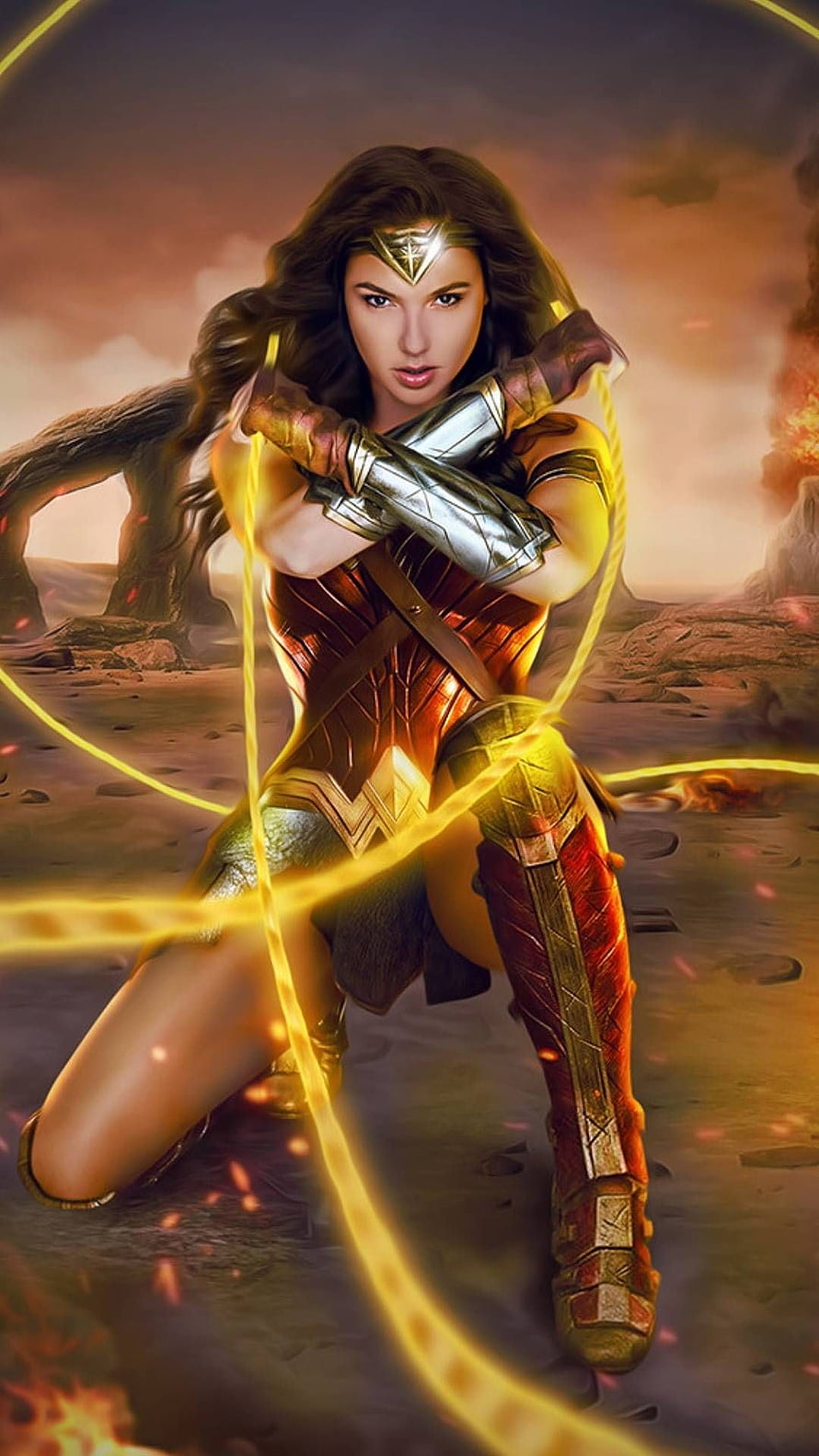 Wonder Woman in Combat Stance Wielding Lasso of Truth in a Fiery Battlefield HD phone wallpaper