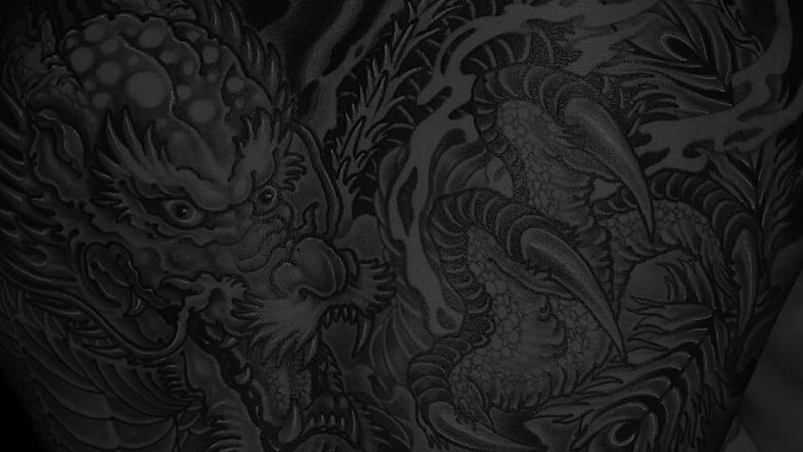 Dark Japanese Dragon Tattoo Design with Intricate Scales and Claws HD wallpaper