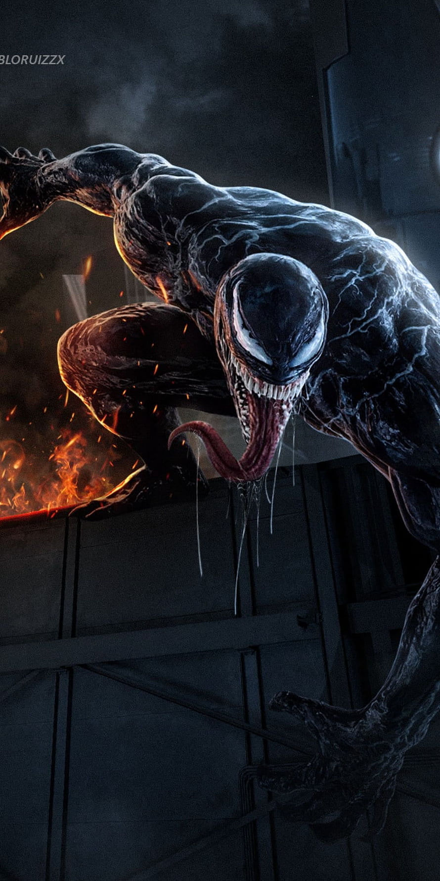 Venom Crouching in Dark Industrial Setting with Fire and Sparks HD phone wallpaper