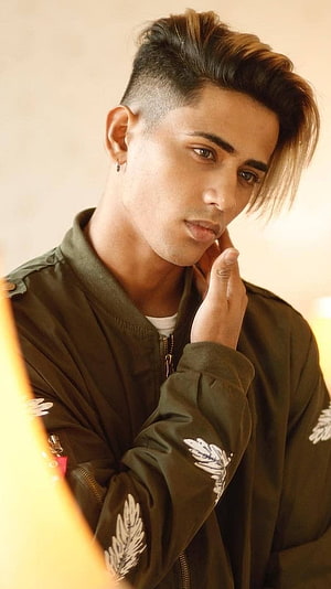Danish Zehen in an olive bomber jacket with a modern undercut hairstyle HD phone wallpaper