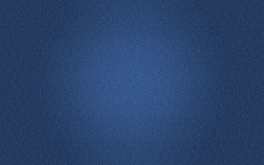 Minimalist Dark Blue Gradient Texture with Soft Central Glow and Subtle Film Grain HD wallpaper