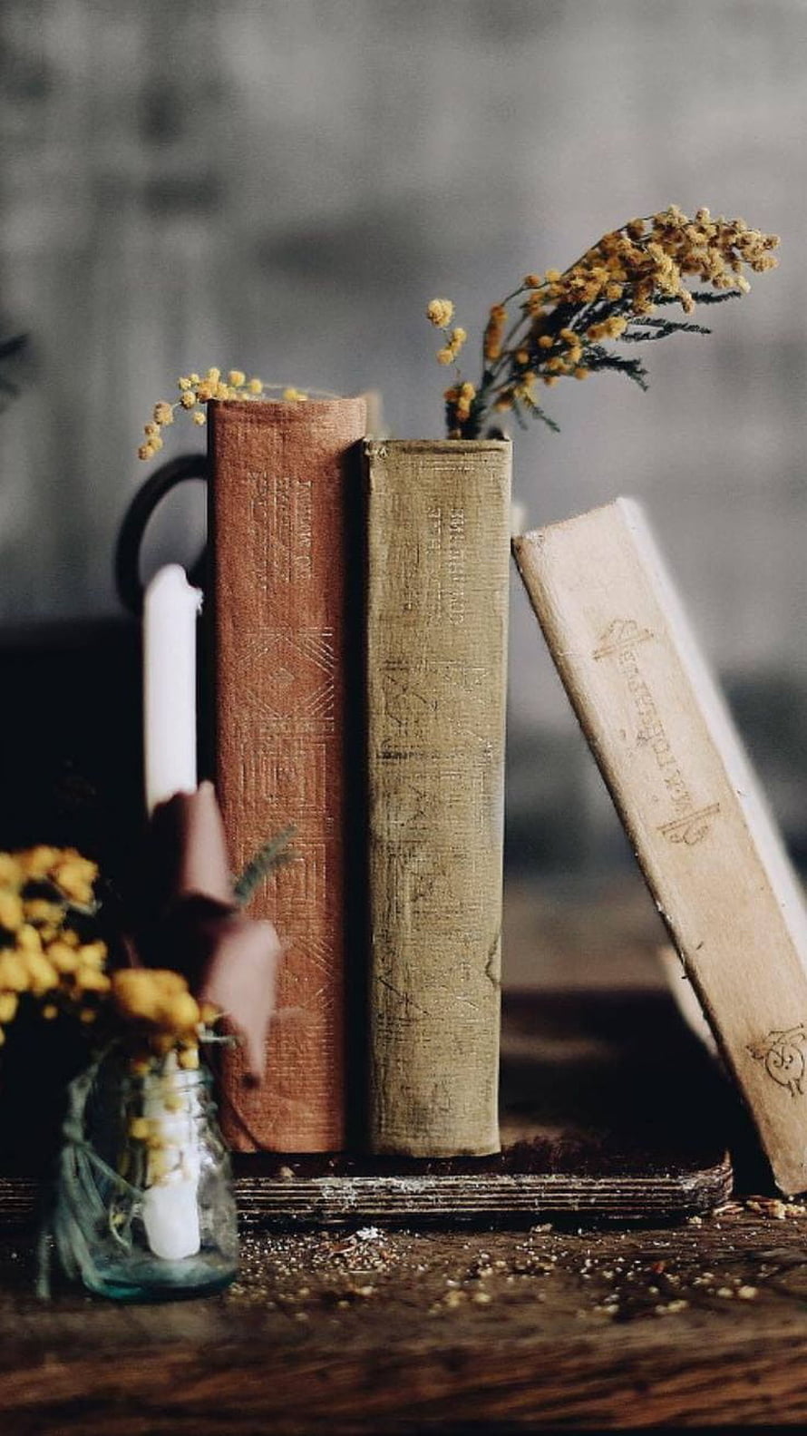 Vintage Books and Dried Flowers on a Rustic Wooden Table HD phone wallpaper
