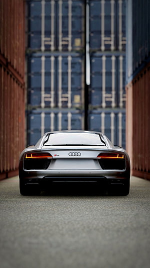 Rear View of Silver Audi R8 Super Car Parked in Industrial Shipping Container Yard HD phone wallpaper