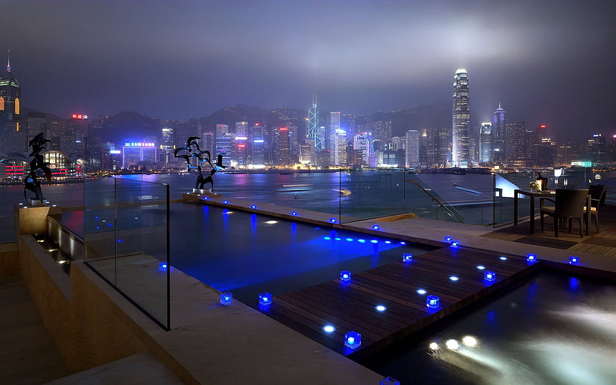 Luxury Rooftop Infinity Pool With Blue Lighting Overlooking Hong Kong Victoria Harbour At Night HD wallpaper