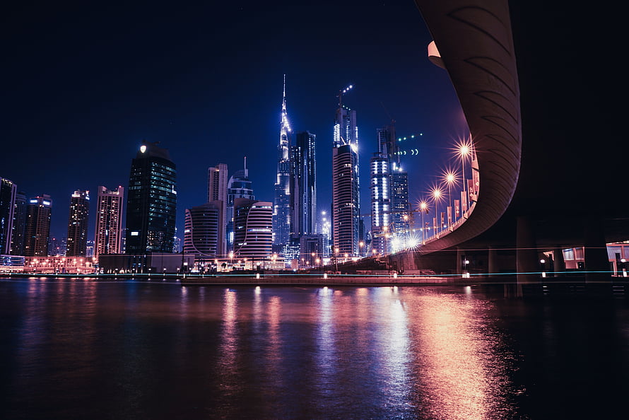 Dubai Marina Night Skyline with Burj Khalifa and Curved Bridge Reflections HD wallpaper