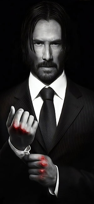 John Wick in a black suit with blood-stained hands against a dark background HD phone wallpaper