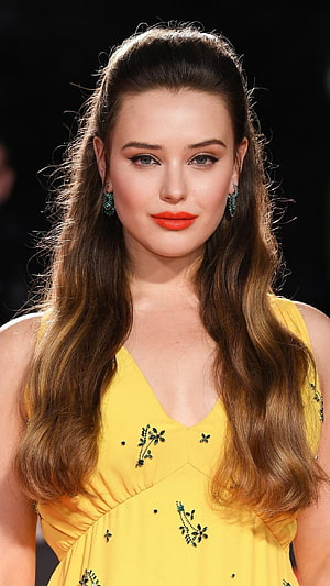Katherine Langford in Yellow Embroidered Dress with Emerald Earrings and Red Lipstick HD phone wallpaper
