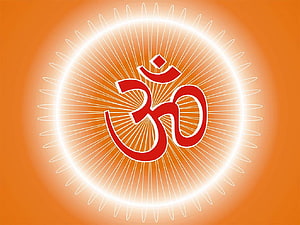 Glowing Red Om Symbol With Radiant Sunburst Rays On Warm Orange Background HD wallpaper