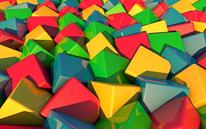 Vibrant 3D Render of Scattered Multicolored Cubes in Red, Green, Yellow, and Blue HD wallpaper