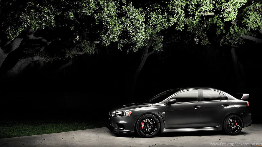 Mitsubishi Lancer Evolution X Sedan Parked Under Illuminated Trees at Night HD wallpaper