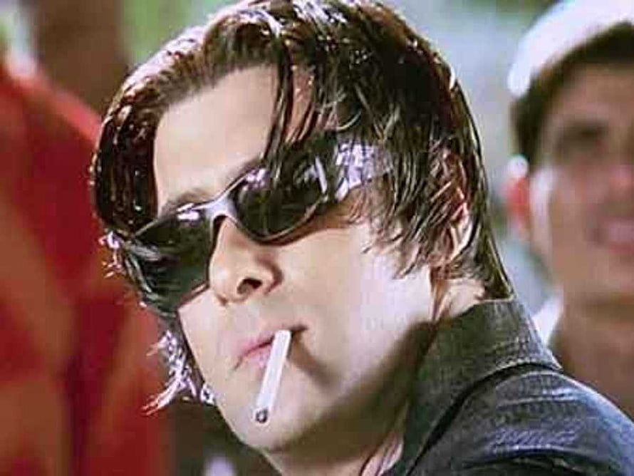 Salman Khan in a moody close-up wearing dark sunglasses and a cigarette HD wallpaper