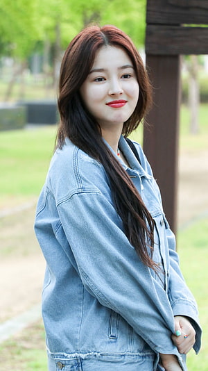 Nancy Momoland in a Light Denim Jacket with Long Hair in a Park Setting HD phone wallpaper