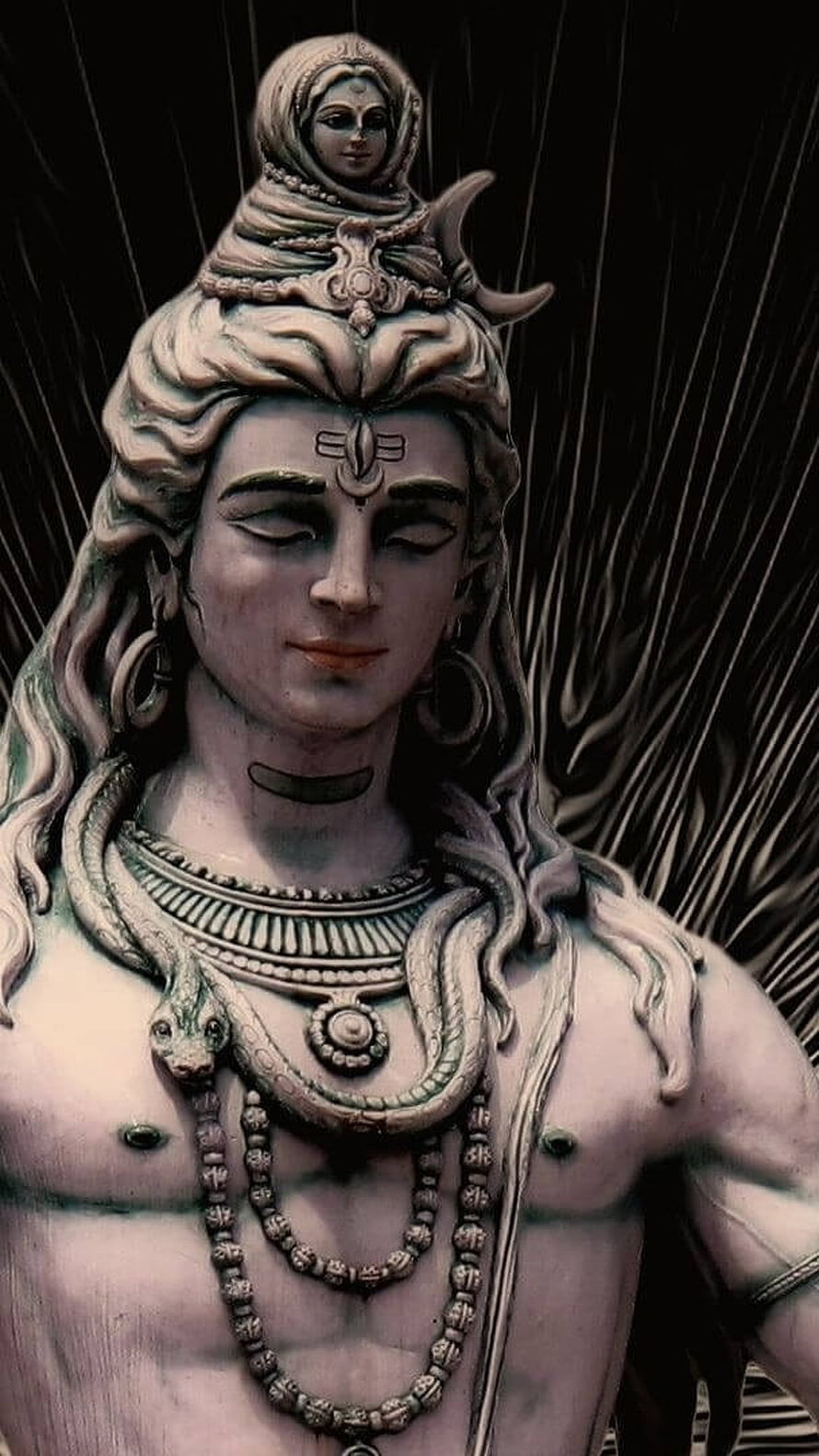 Lord Shiva Sculpture with Serpent Adornment and Serene Expression HD phone wallpaper