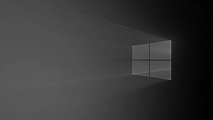 Minimalist Windows 10 Dark Mode Wallpaper with Glowing Four-Pane Window in Shadowy Room HD wallpaper