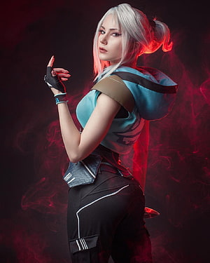 Jett Valorant Cosplay Portrait with Red Smoke and Dramatic Lighting HD phone wallpaper