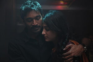 Moonu Movie Still: Intimate Embrace in Dim Cinematic Lighting HD wallpaper