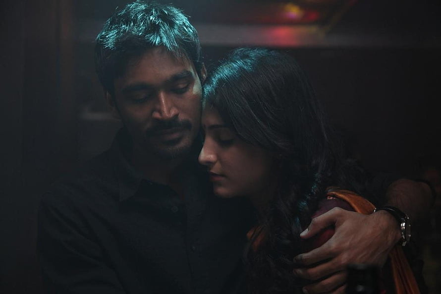 Moonu Movie Still: Intimate Embrace in Dim Cinematic Lighting HD wallpaper
