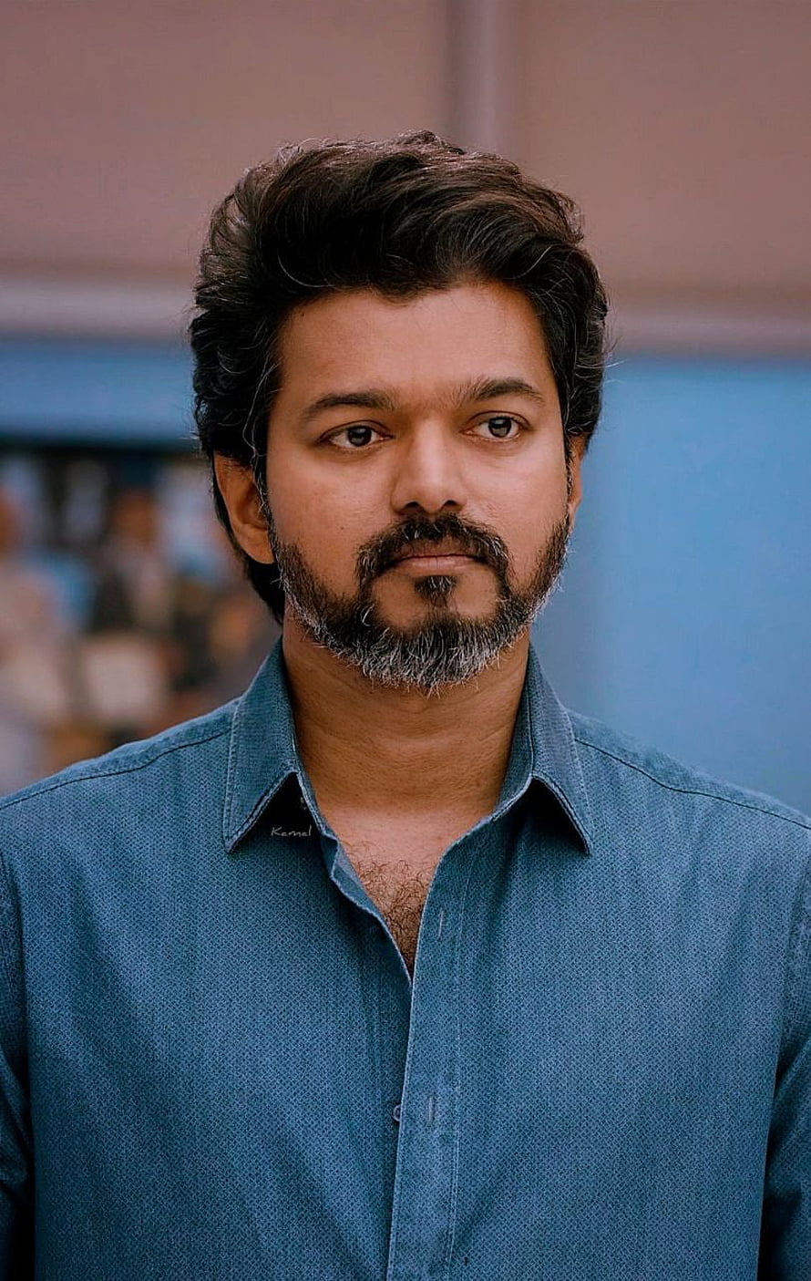 Vijay Portrait in Blue Denim Shirt with Groomed Beard and Intense Gaze HD phone wallpaper