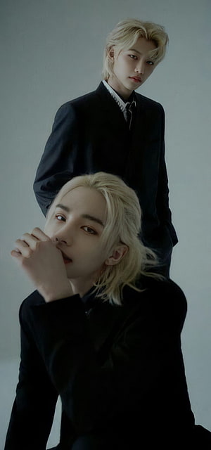Stray Kids Hyunjin and Felix in Black Suits with Platinum Blonde Hair HD phone wallpaper