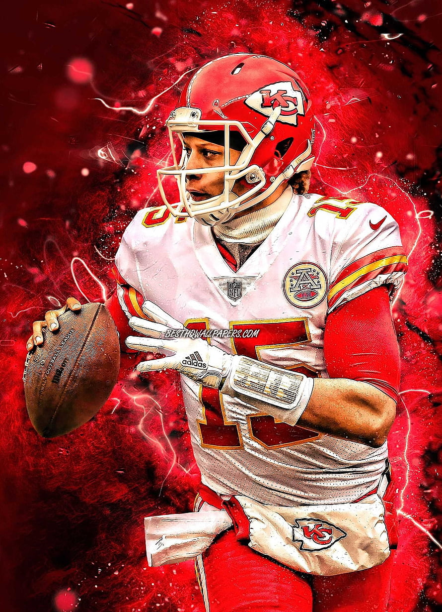 Patrick Mahomes in Kansas City Chiefs uniform holding football with red energy background HD phone wallpaper