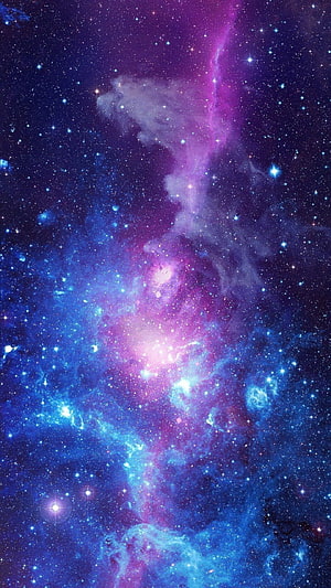Vibrant Purple and Blue Nebula Clouds in Deep Space with Scattered Stars HD phone wallpaper