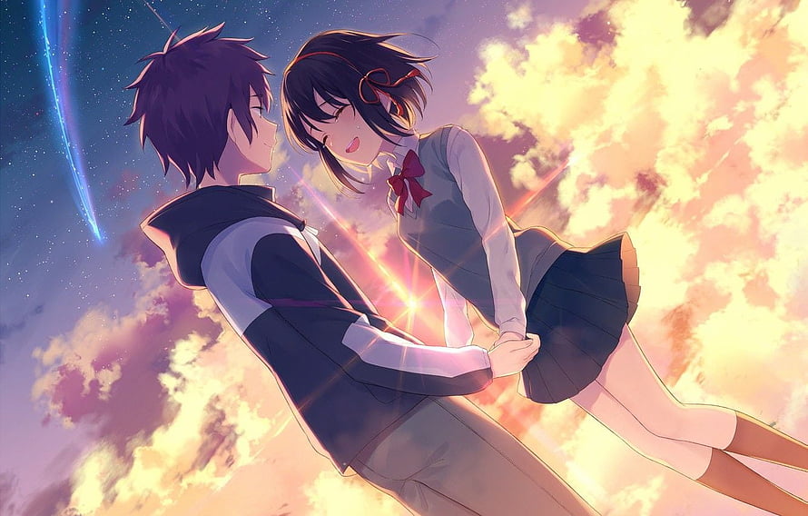 Anime Couple Sharing a Tender Moment Against a Vibrant Sunset Sky HD wallpaper