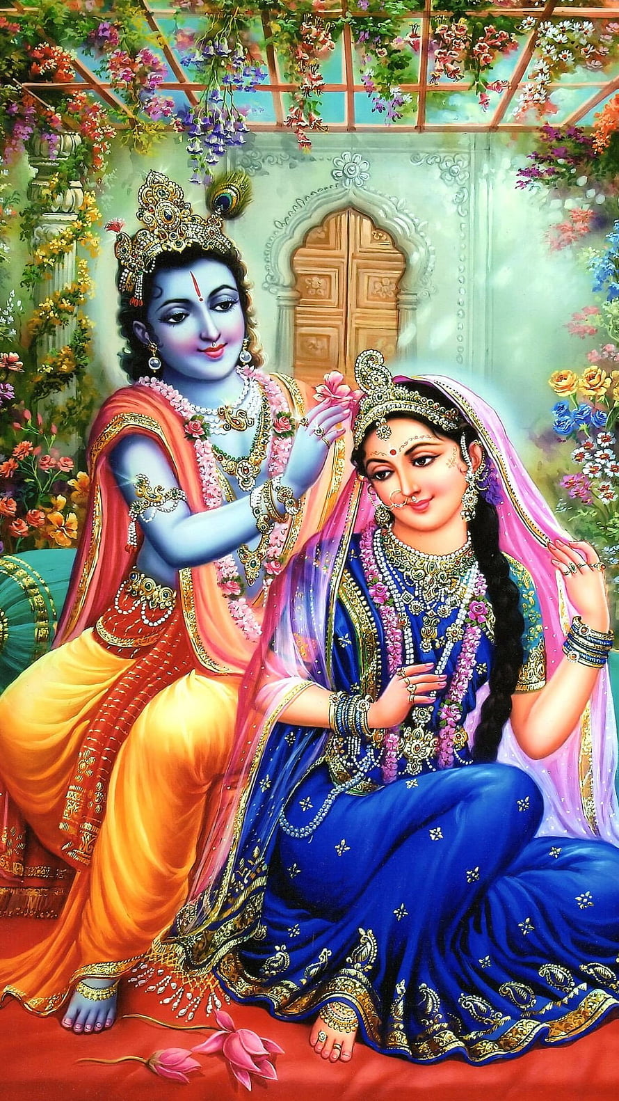 Radha Krishna in a Flower-Filled Garden with Traditional Indian Jewelry and Sarees HD phone wallpaper