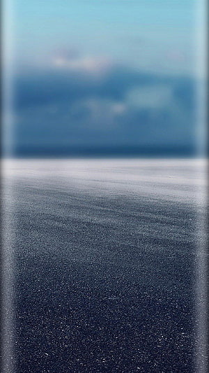 Serene Ocean Horizon with Soft Blue Sky and Calm Water Surface HD phone wallpaper