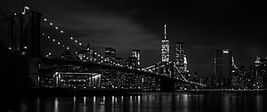 Brooklyn Bridge and Manhattan Skyline at Night in Black and White HD wallpaper
