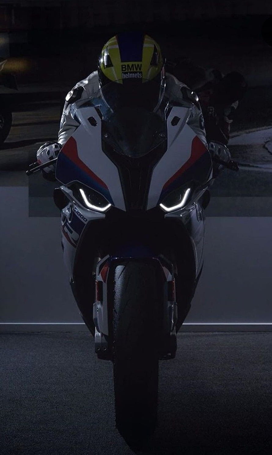 BMW S 1000 RR Superbike Front View with Rider in Dark Setting HD phone wallpaper