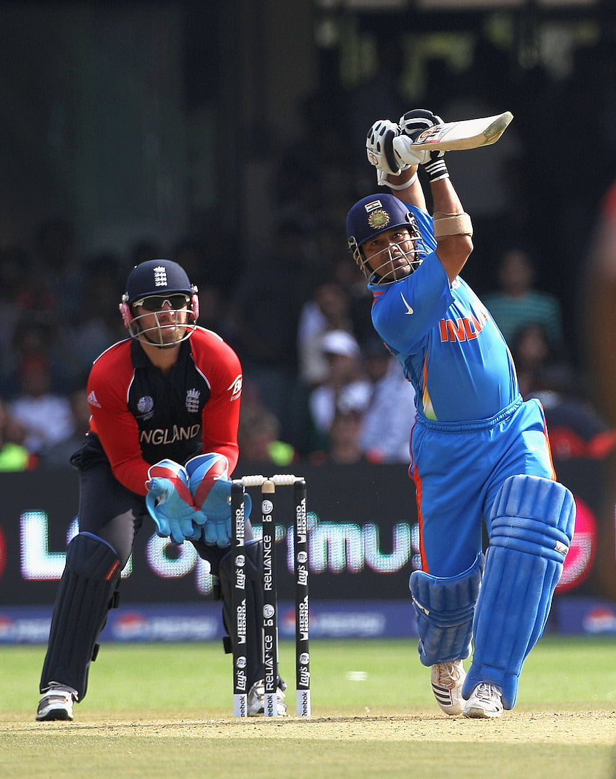 Sachin Tendulkar Playing a Powerful Shot in India Cricket Kit HD phone wallpaper