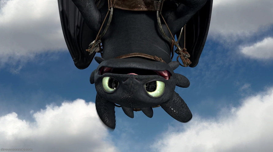 Toothless Night Fury Dragon Flying Upside Down in Blue Sky HD wallpaper