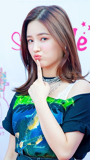 Nancy from Momoland in a playful pose with a Marshall guitar print top and layered jewelry HD phone wallpaper