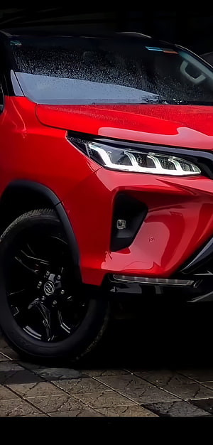 Red Toyota Fortuner Front Quarter Close-Up with Black Alloy Wheels HD phone wallpaper