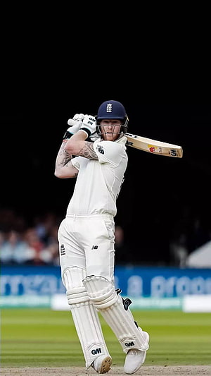 Ben Stokes in England Test Kit Executing a Powerful Cricket Batting Stroke HD phone wallpaper