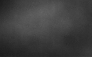 Dark Gray Minimalist Texture Background with Subtle Gradient and Soft Lighting HD wallpaper