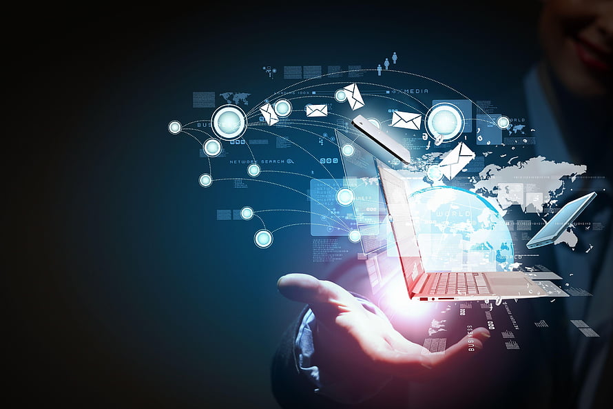 Hand Holding Holographic Laptop with Global Network and Data Connections HD wallpaper