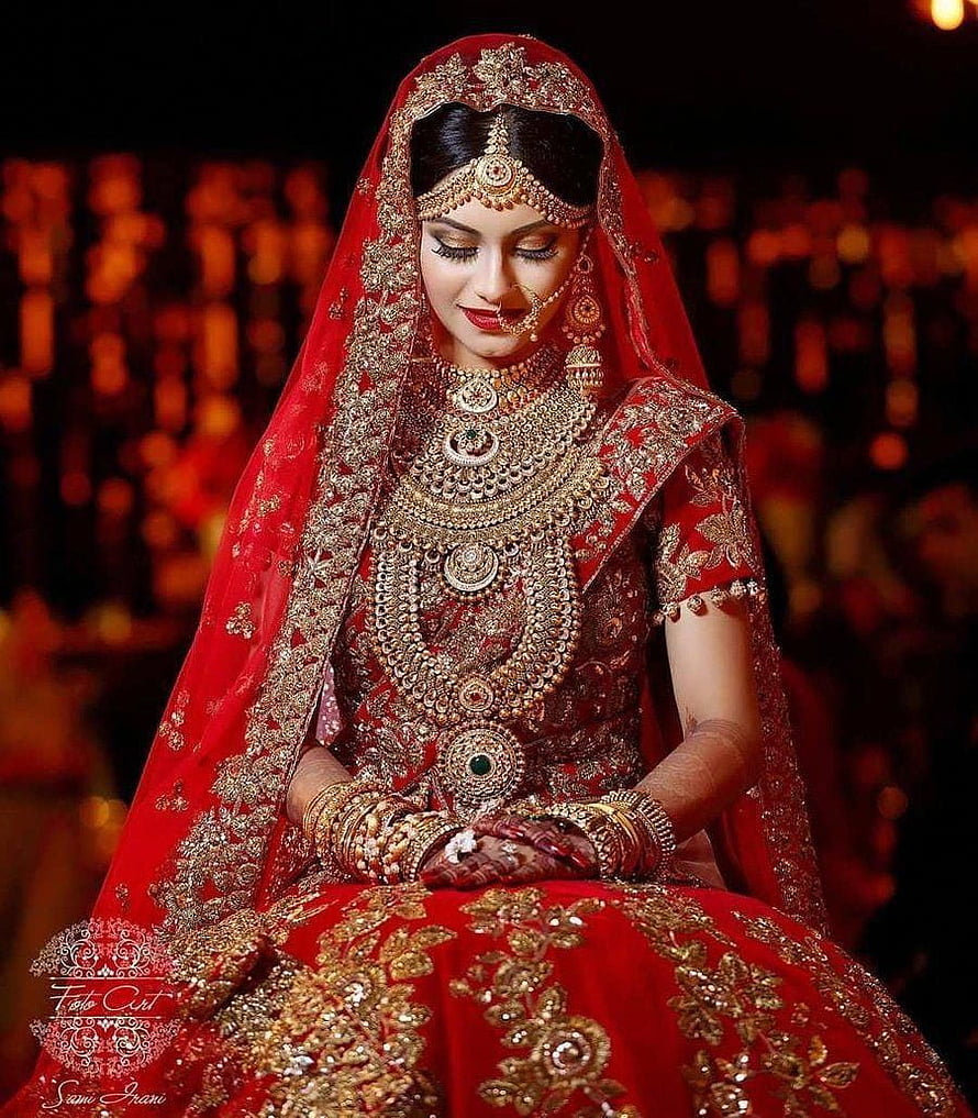 Indian Bride in Red Lehenga with Heavy Gold Jewelry and Embroidered Dupatta HD phone wallpaper