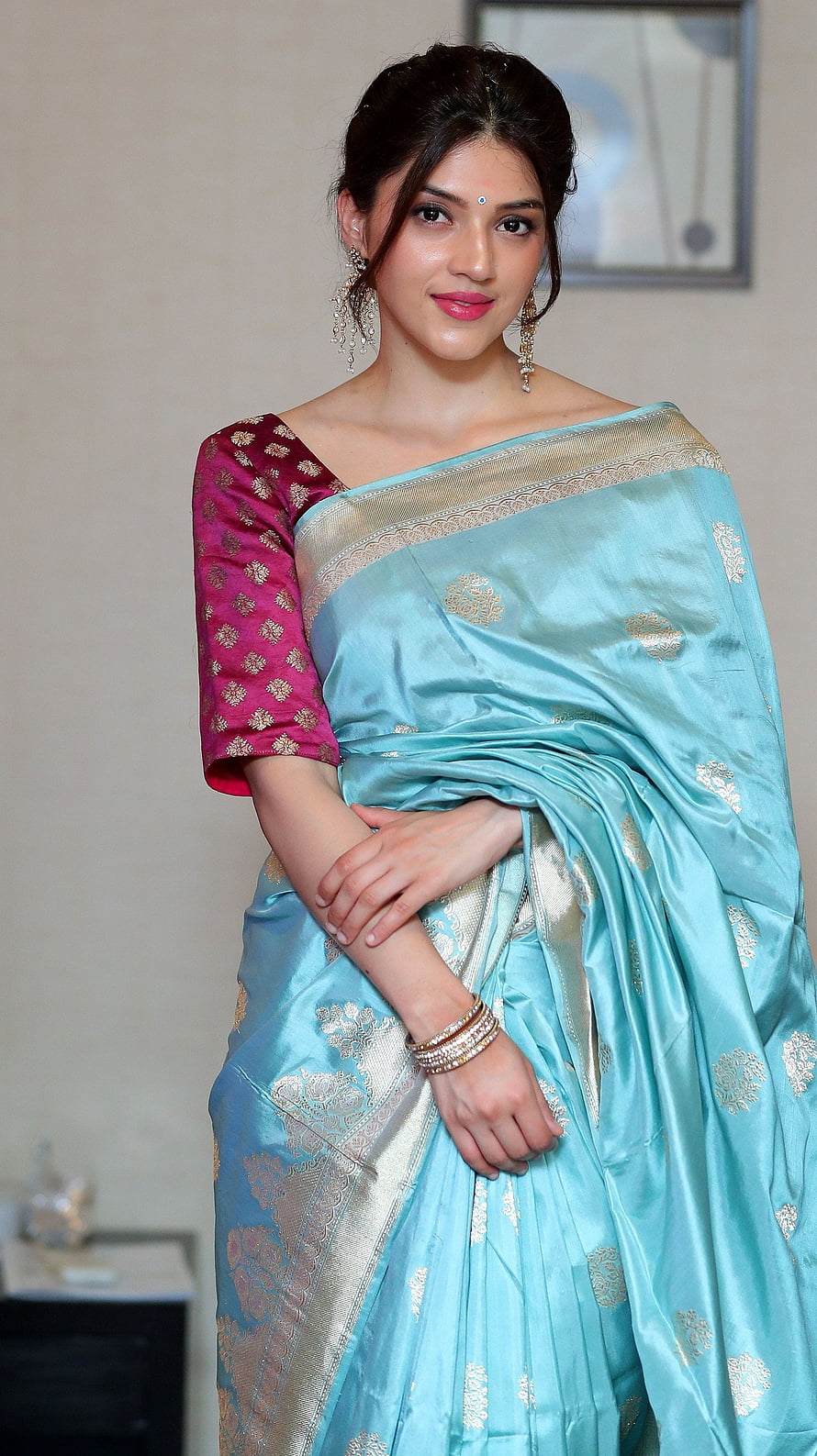 Mehreen Pirzada in a Turquoise Silk Saree with Gold Zari Border and Maroon Blouse HD phone wallpaper