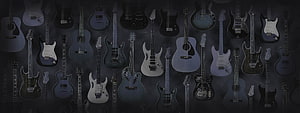 Dark Wall Display of Electric and Acoustic Guitars in Monochrome Tones HD wallpaper