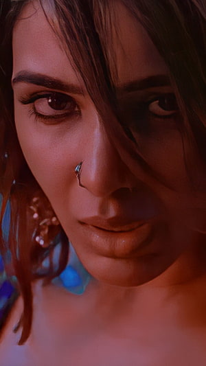 Samantha Akkineni Close-Up Portrait with Nose Ring and Dramatic Warm Lighting HD phone wallpaper