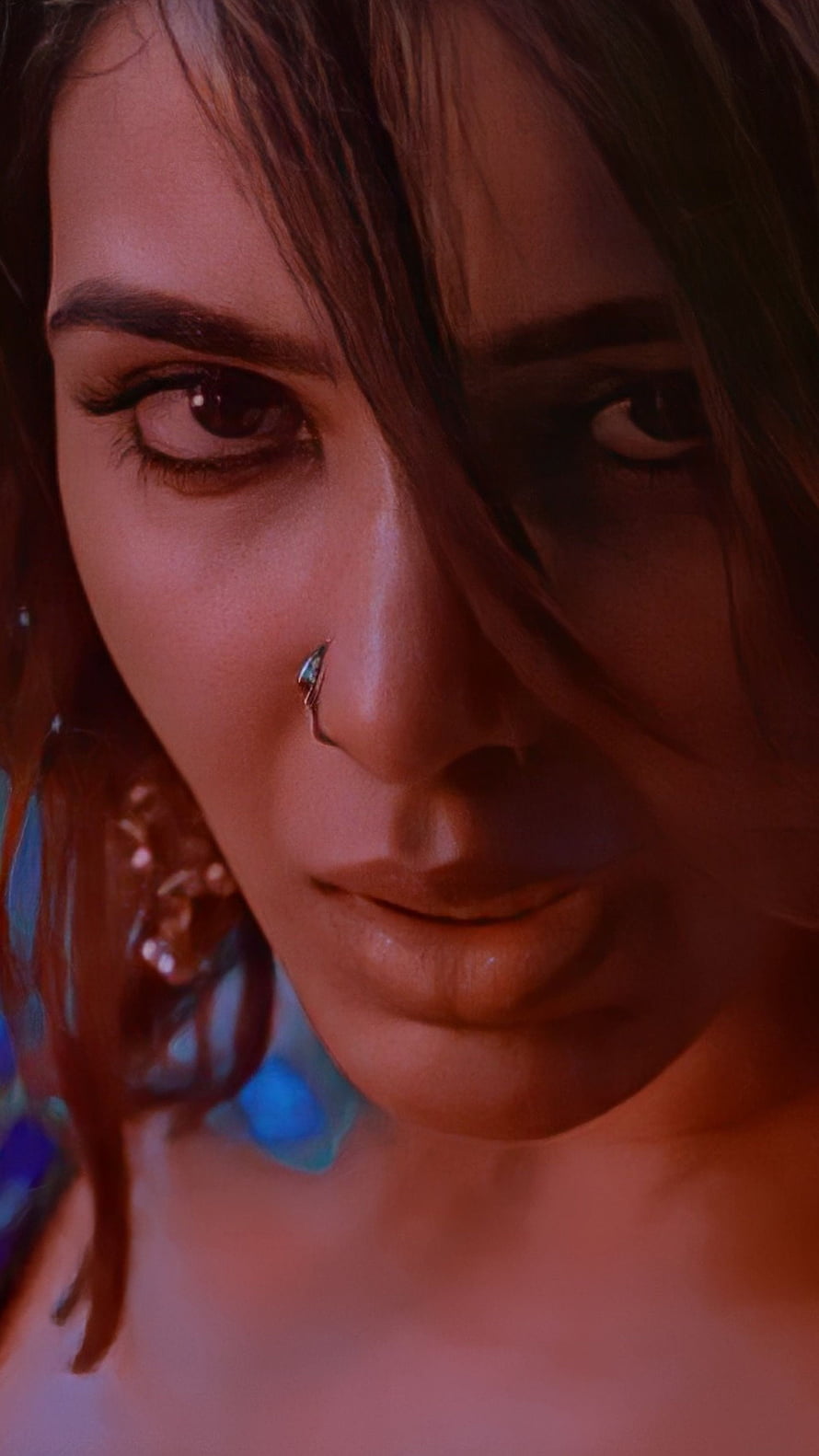 Samantha Akkineni Close-Up Portrait with Nose Ring and Dramatic Warm Lighting HD phone wallpaper