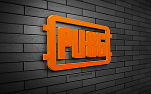 PUBG 3D Orange Logo Mounted on Dark Gray Brick Wall HD wallpaper